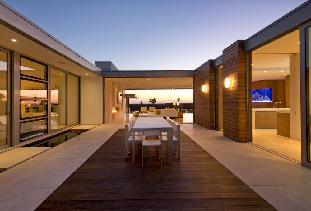 EYRC Architects Irvine Cove Residence interior courtyard night